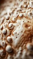 ai generato avvicinamento di dettagliato caffè schiuma, evidenziare il dettagliato modelli e textures nel il schiuma di un' appena fermentato tazza di caffè, sfondo Immagine, generativo ai foto