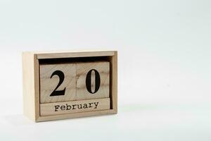 di legno calendario febbraio 20 su un' bianca sfondo foto