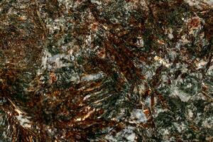 macro minerale pietra astrofillite bianca sfondo foto