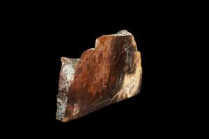 macro pietra minerale diaspro su nero sfondo foto