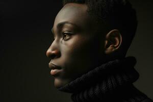 ai generato drammatico profilo ritratto di un' giovane nero uomo foto