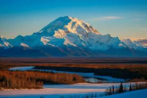 ai generato d'oro leggero su denali picchi foto