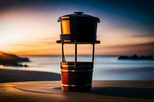 un' rosso e nero caffè pentola seduta su il spiaggia a tramonto. ai-generato foto