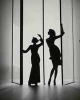 ai generato silhouette di tre donne nel nero e bianca vestiti, studio sparo. ai generativo foto