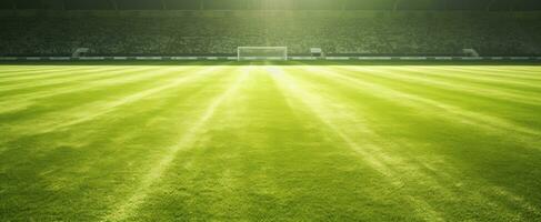 ai generato verde calcio campo con sole splendente attraverso su giallo erba foto