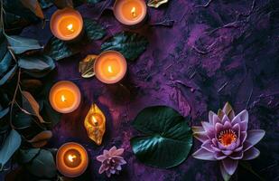 ai generato un' mazzo di tealight candele su un' viola sfondo con loto fiore foto