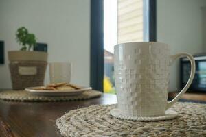 tazza di caffè sul tavolo foto