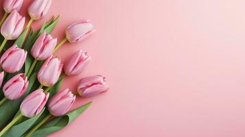 ai generato mazzo di rosa tulipani fiori su pastello rosa sfondo foto