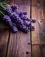 ai generato mazzo di lavanda fiori su di legno sfondo, selettivo messa a fuoco. foto