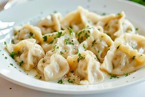 ai generato Ravioli servito su un' bianca piatto. ai generato foto