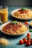 ai generato Due piatti di spaghetti e un' bicchiere di pomodoro succo foto