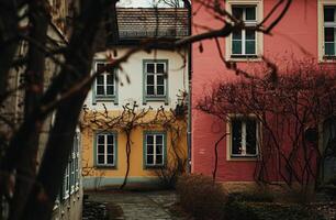 ai generato un' colorato Casa con un vecchio edificio nel il sfondo foto