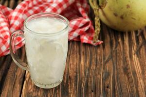 es kelapa mudà o giovane Noce di cocco ghiaccio foto