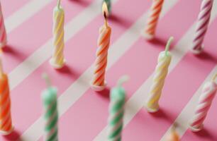 ai generato compleanno colorato candele disposte su un' rosa sfondo foto