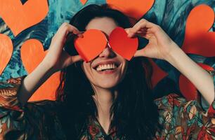 ai generato donna sorridente con rosso cuore carta al di sopra di sua occhi, foto