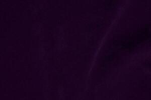 buio viola velluto tessuto struttura Usato come sfondo. viola colore viola tessuto sfondo di morbido e liscio tessile Materiale. schiacciato velluto .lusso buio tono per seta. foto