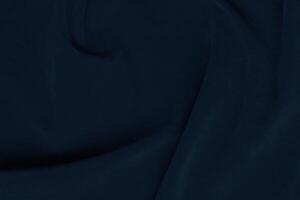 buio blu velluto tessuto struttura Usato come sfondo. seta colore denim tessuto sfondo di morbido e liscio tessile Materiale. schiacciato velluto .lusso Marina Militare blu buio tono per seta. foto