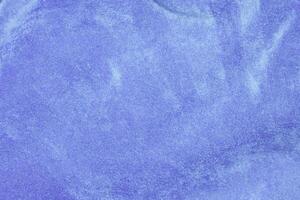 leggero blu velluto tessuto struttura Usato come sfondo. seta colore denim tessuto sfondo di morbido e liscio tessile Materiale. schiacciato velluto .lusso Marina Militare blu leggero tono per seta. foto