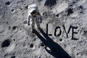 ai generato un' spazio scena a crepuscolo con un' amore parola disegnato nel il Luna .ai generativo foto