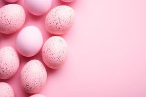 ai generato dipinto maculato uova su un' rosa sfondo, pastello colori, Pasqua sfondo, superiore Visualizza. foto