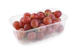 grappolo d'uva in contenitore di plastica foto