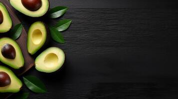 ai generato fresco avocado con le foglie su buio sfondo con spazio per testo. foto