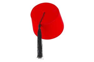 rosso cappello fez isolato su bianca sfondo foto