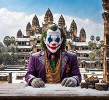 ai generato clown seduta su un' di legno tavolo nel davanti di Angkor cosa, Cambogia foto