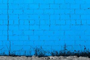blu gesso ruvido mattone al di fuori parete struttura foto