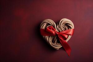 ai generato cuore fatto di corda su un' rosso sfondo. san valentino giorno concetto. foto