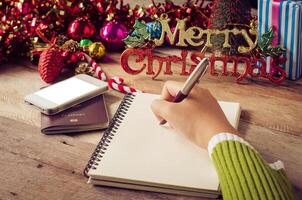 scrivere a mano componente per Natale. foto