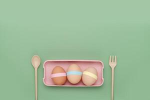 decorato uova nel pranzo scatola con posate vuoto sfondo. divertimento Pasqua picnic sfondo foto