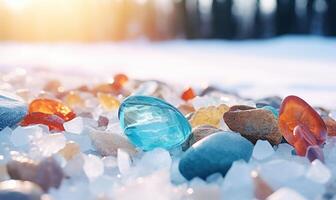 ai generato colorato pietre nel il neve su il riva di il lago. foto