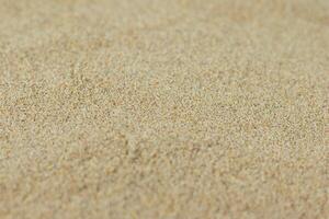 sabbia struttura. spiaggia sabbia per sfondo foto