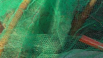 verde pesca rete. verde mucchio di commerciale pesca rete. foto