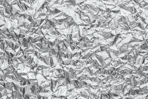 metallo lucido grigio argento lamina stropicciata sfondo texture foto