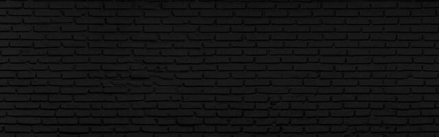 astratto nero mattone parete struttura per sfondo o sfondo design. panorama immagine. foto
