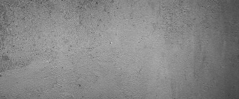 grungy grigio sfondo di naturale pennello ictus strutturato cemento o pietra vecchio. calcestruzzo struttura come un' retrò modello parete concettuale. foto