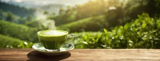 ai generato un' tazza di matcha latte macchiato sta su un' di legno tavolo con un' panoramico sfondo. il caldo luce del sole si illumina il vapore crescente a partire dal un' appena preparato verde tè bevanda, con verdeggiante tè foto