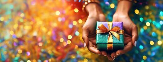 ai generato mani presentazione un' regalo scatola con un' d'oro nastro, contro un' bokeh sfondo pieno di festivo colori, evocando un' senso di celebrazione e sorpresa foto