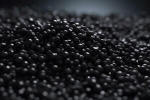 ai generato nero plastica pellet mucchio avvicinamento. creare ai foto