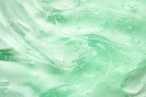 trasparente chiaro verde liquido siero gel cosmetico struttura sfondo foto