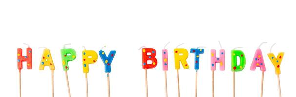 colorato candele nel lettere detto contento compleanno, foto