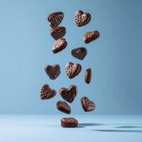 ai generato cioccolato biscotti nel il forma di cuori volante contro un' blu sfondo foto
