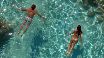 ai generato Due persone nuoto nel acqua foto