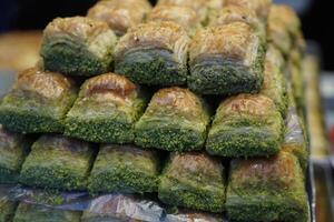 Turco baklava con pistacchio tradizionale ottomano caramella dolce foto