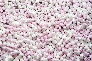 rosa e bianca mini gonfio marshmallows sfondo, avvicinamento struttura foto