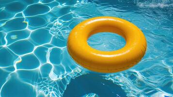 ai generato giallo piscina galleggiante, squillare galleggiante nel un' rinfrescante blu nuoto piscina foto