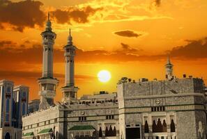 il minareti di il meccan kaaba con sorprendente tramonto. Mecca, Arabia arabia foto