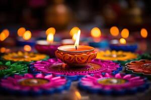 ai generato colorato argilla diya lampade illuminato durante Diwali celebrazione foto